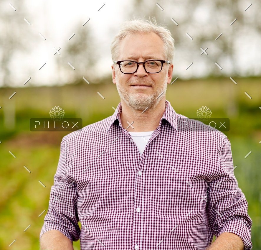 demo-attachment-444-senior-man-with-box-of-vegetables-on-farm-PHMQ8WB@2x-1